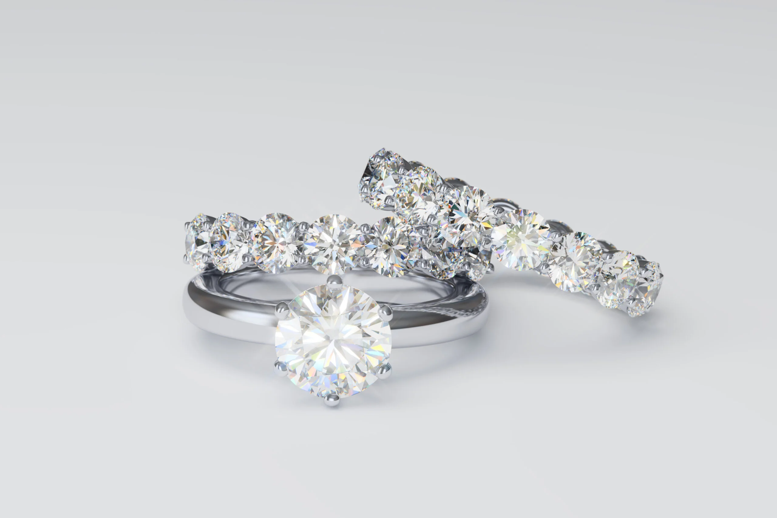 Solitaire diamond engagement ring, two diamond eternity bands o